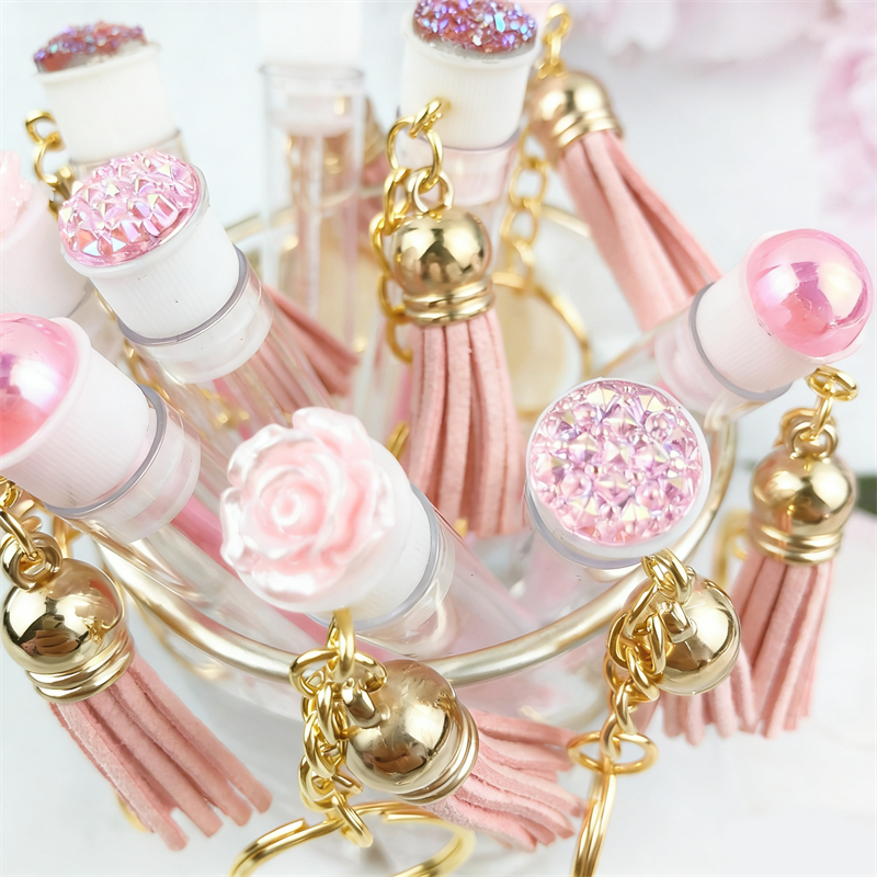 Beauty Makeup Background - Pink Gold Eyelash Brush Tube With